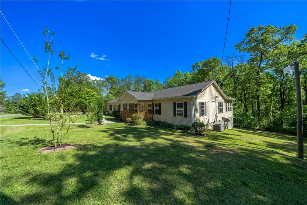 25 Quail Ridge Road Taylorsville, GA 30178 - Photo 27 of 29 a view of a house with a big yard