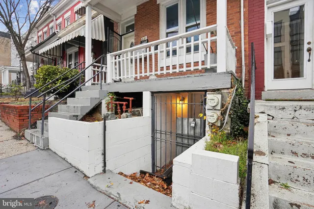 front view of a house with a small yard