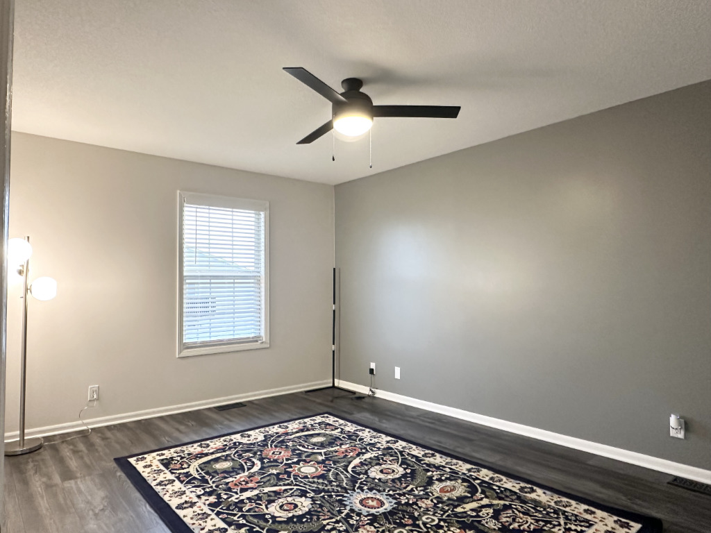 1514 Northfield Meadows Boulevard, Unit 2 Bourbonnais, IL 60914 - Photo 19 of 30 a view of an empty room with a window