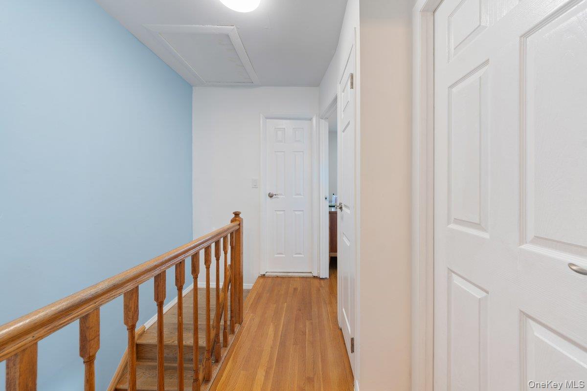 902 Dean Avenue Bronx, NY 10465 - Photo 13 of 40 a view of a hallway with wooden floor