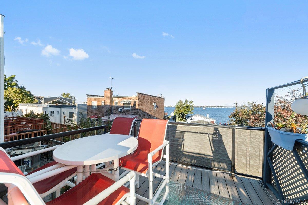 902 Dean Avenue Bronx, NY 10465 - Photo 30 of 40 a outdoor dining space with furniture and city view