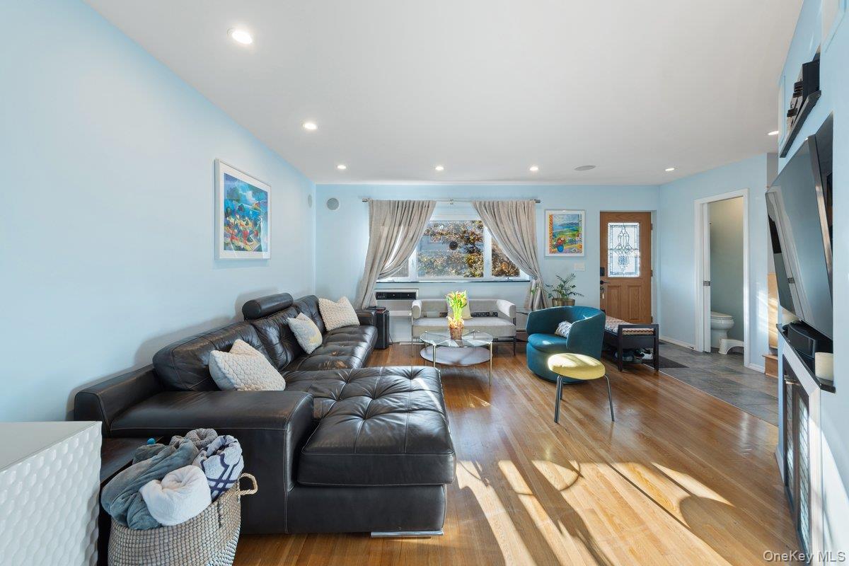 902 Dean Avenue Bronx, NY 10465 - Photo 7 of 40 a living room with furniture and a flat screen tv