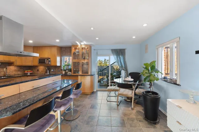 a kitchen with a sink and counter top space