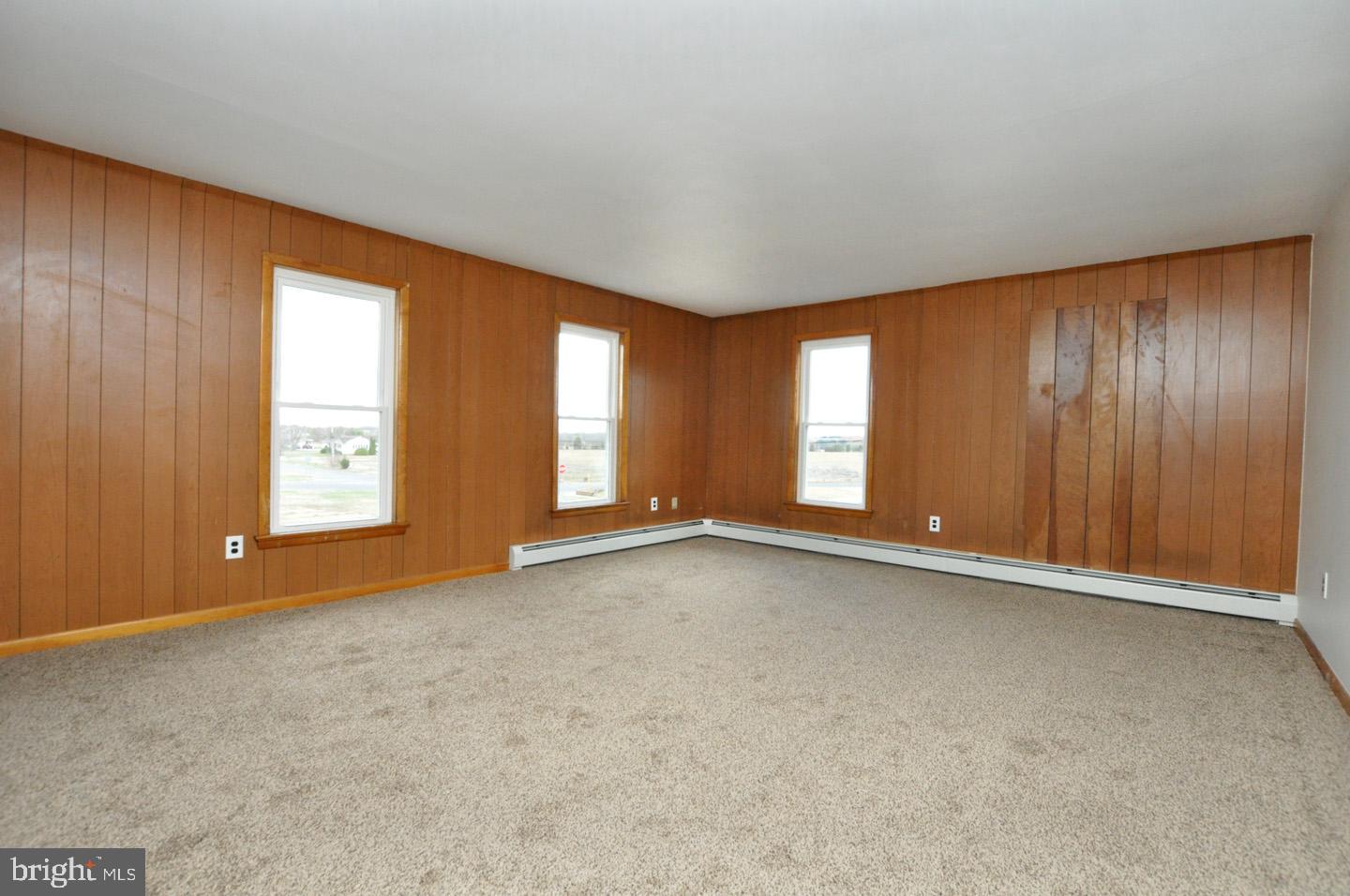 614 11th Street, Unit 2 Hammonton, NJ 08037 - Photo 11 of 12 an empty room with windows