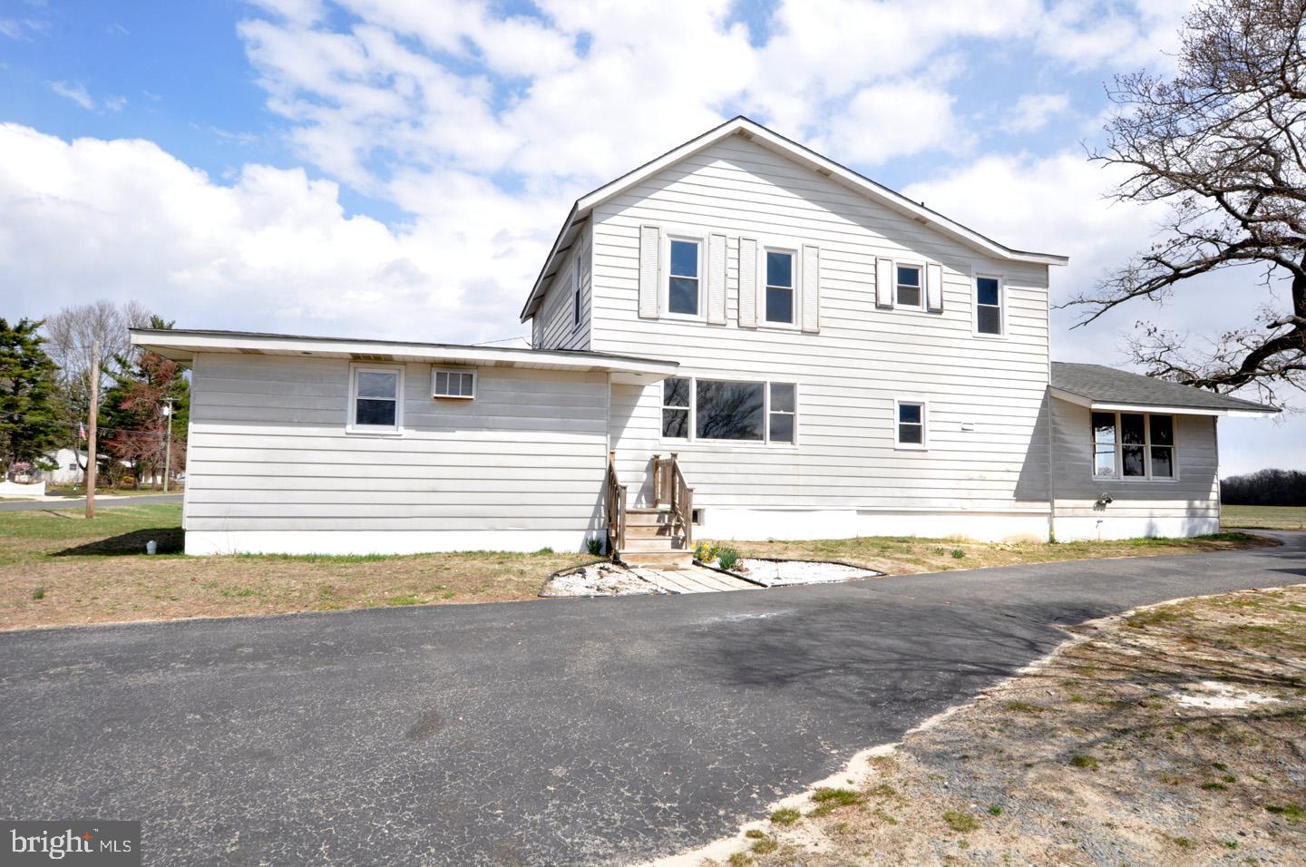 614 11th Street, Unit 2 Hammonton, NJ 08037 - Photo 3 of 12 a view of a house with backyard and roof