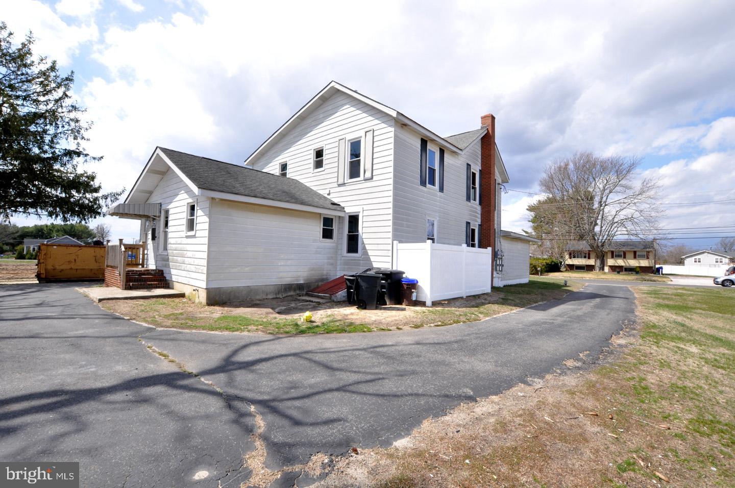 614 11th Street, Unit 2 Hammonton, NJ 08037 - Photo 5 of 12 a view of a house with a yard and road