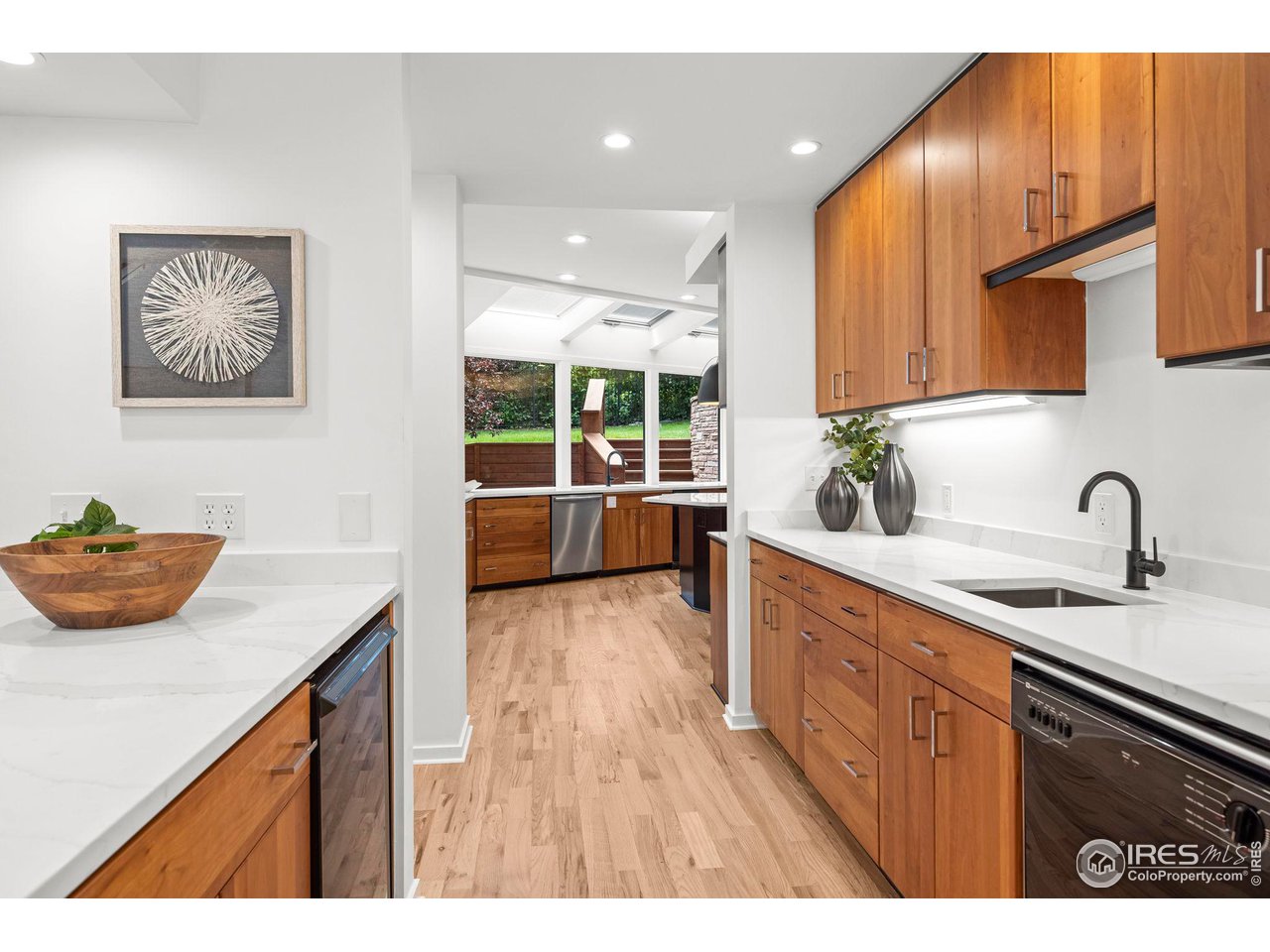 710 Willowbrook Road Boulder, CO 80302 - Photo 13 of 32 a kitchen with stainless steel appliances granite countertop a sink and a stove