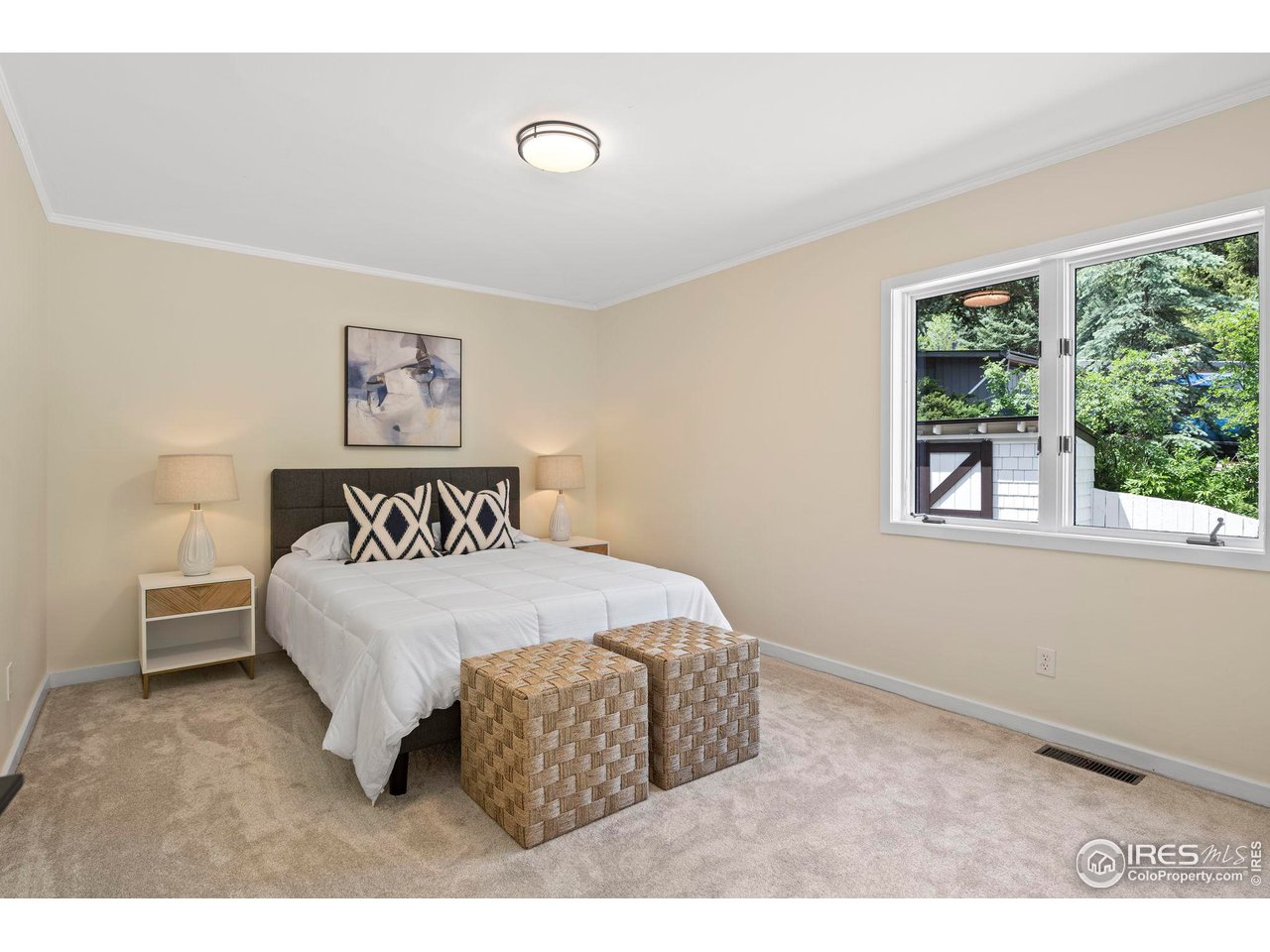 710 Willowbrook Road Boulder, CO 80302 - Photo 15 of 32 a bedroom with a bed and a window