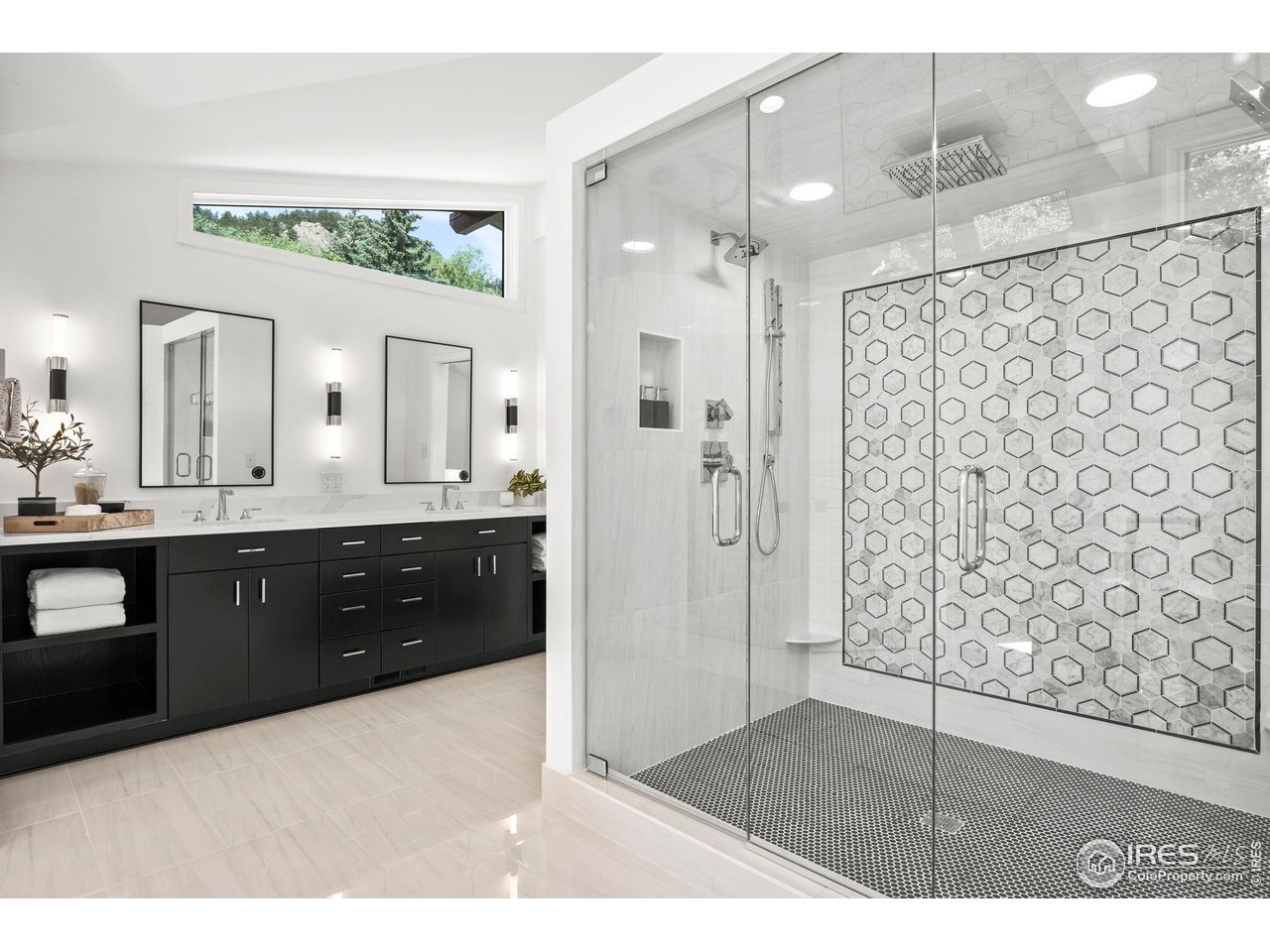 710 Willowbrook Road Boulder, CO 80302 - Photo 19 of 32 a bathroom with a double vanity sink mirror and shower