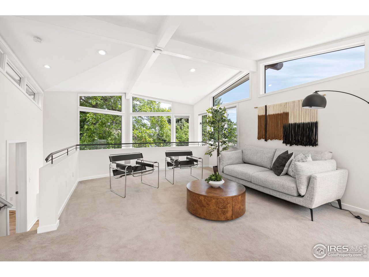 710 Willowbrook Road Boulder, CO 80302 - Photo 22 of 32 a living room with furniture and a large window