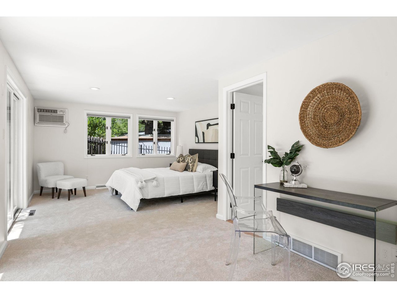 710 Willowbrook Road Boulder, CO 80302 - Photo 24 of 32 a bedroom with a bed and window