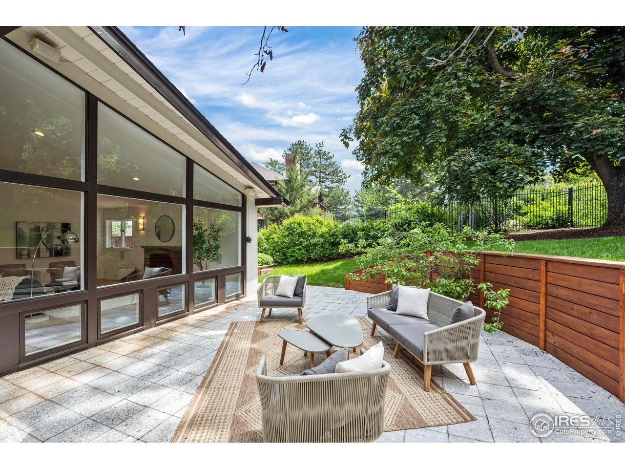 710 Willowbrook Road Boulder, CO 80302 - Photo 27 of 32 a balcony with furniture and a potted plant