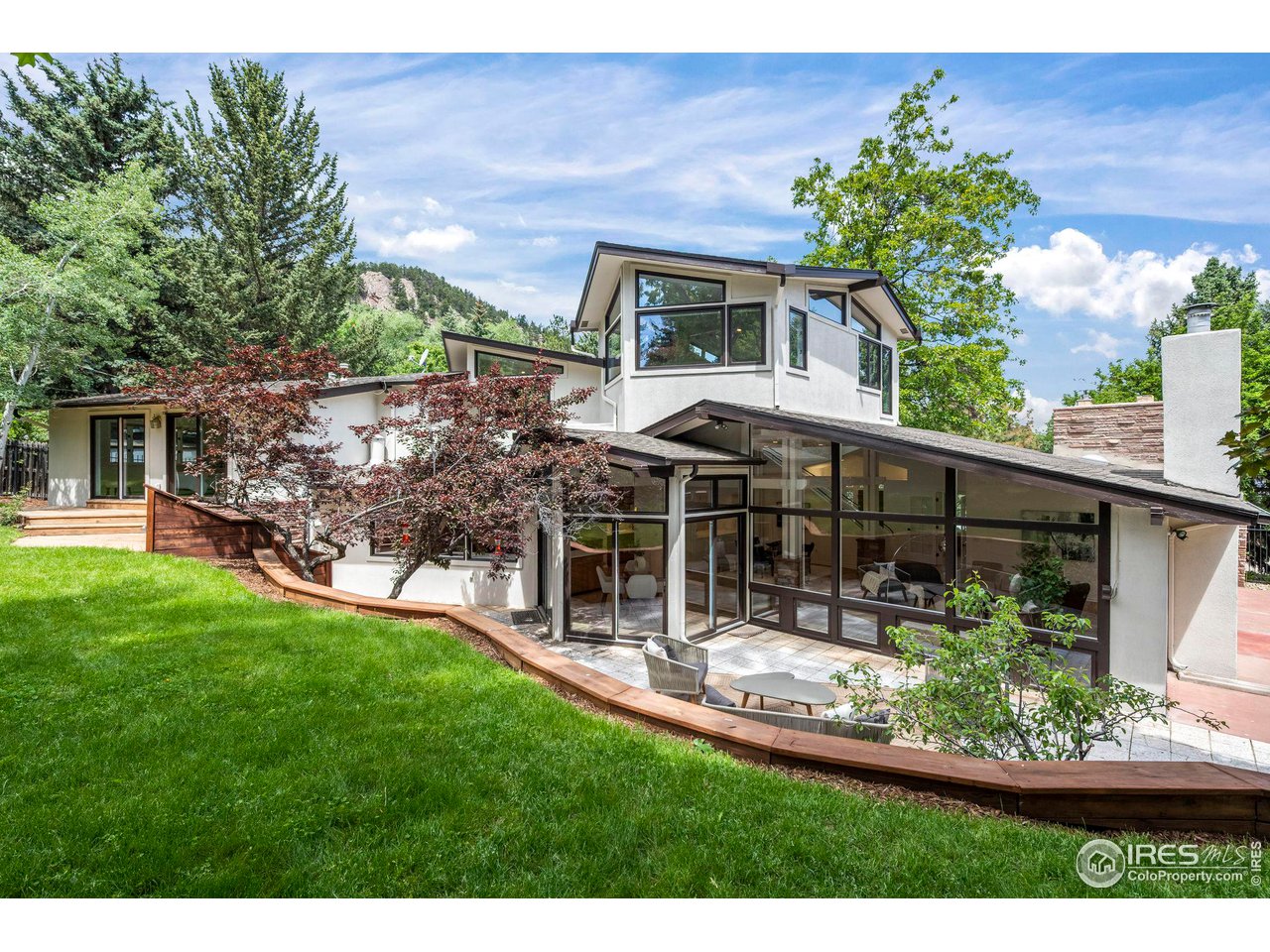 710 Willowbrook Road Boulder, CO 80302 - Photo 29 of 32 a view of a house with backyard and sitting area