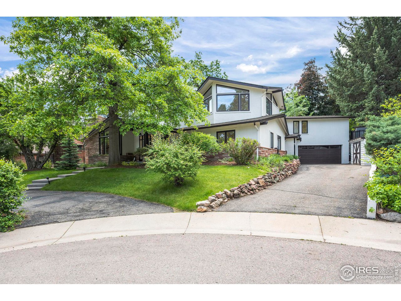 710 Willowbrook Road Boulder, CO 80302 - Photo 3 of 32 a view front of house with a yard and potted plants