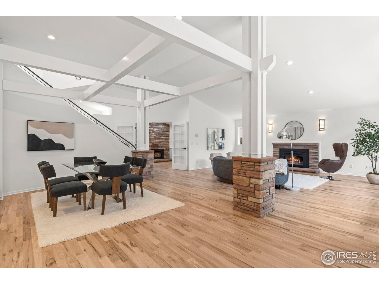 710 Willowbrook Road Boulder, CO 80302 - Photo 5 of 32 a living room with furniture dining table and a potted plant