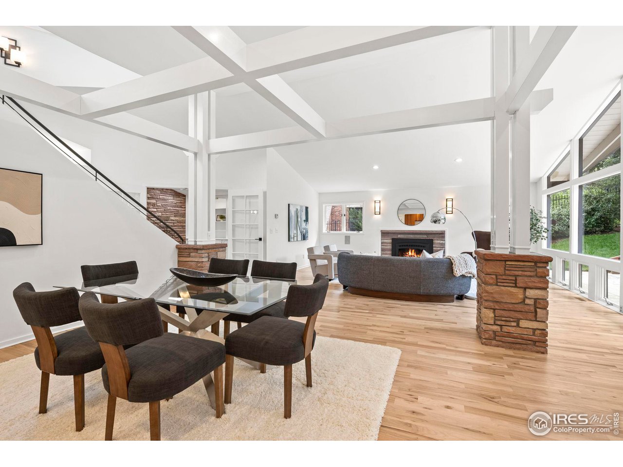 710 Willowbrook Road Boulder, CO 80302 - Photo 32 of 32 a living room with furniture a rug and white walls
