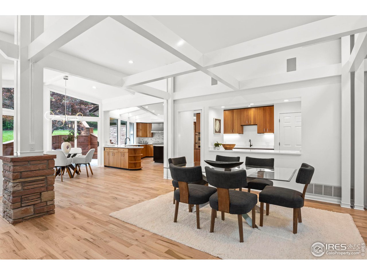 710 Willowbrook Road Boulder, CO 80302 - Photo 8 of 32 a living room with furniture and wooden floor