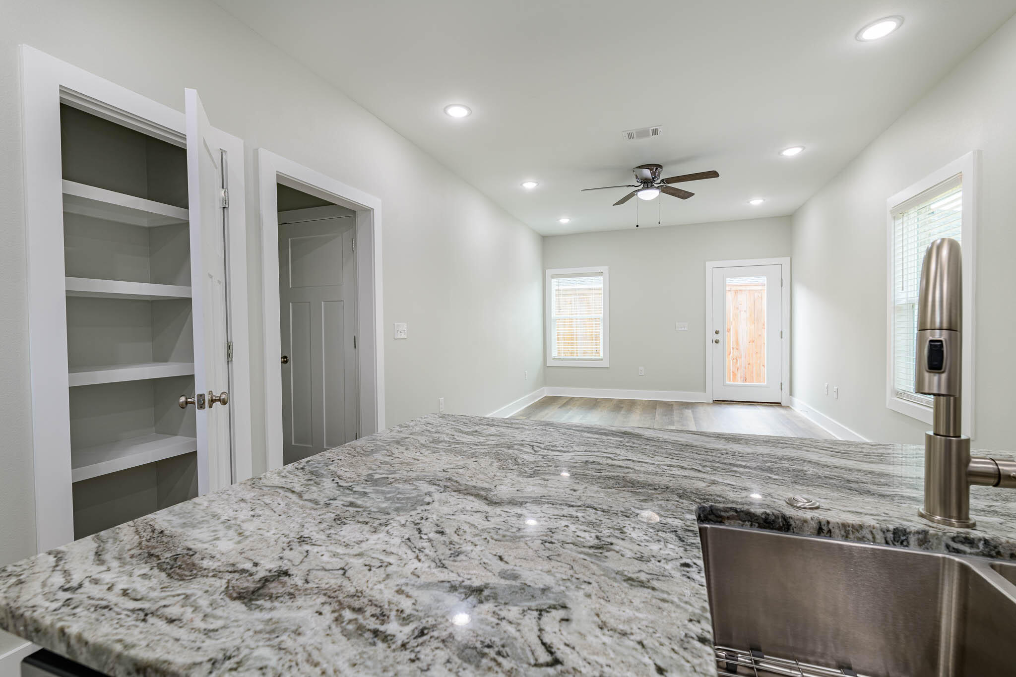 105 Clearing Way Valparaiso, FL 32580 - Photo 22 of 28 a view of kitchen and empty room