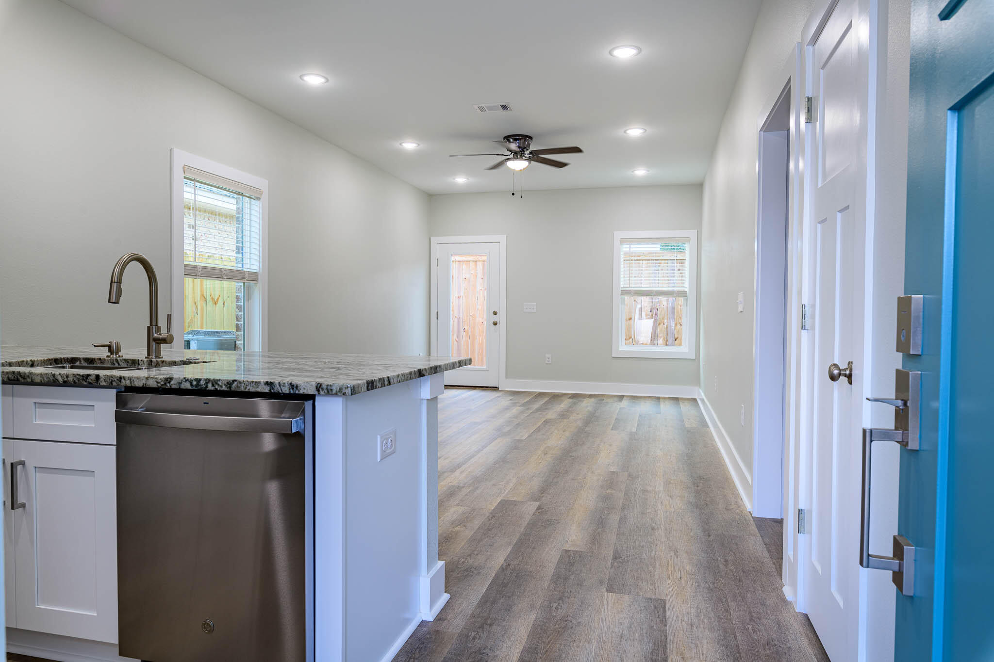 105 Clearing Way Valparaiso, FL 32580 - Photo 26 of 28 a kitchen with granite countertop a stove and a sink