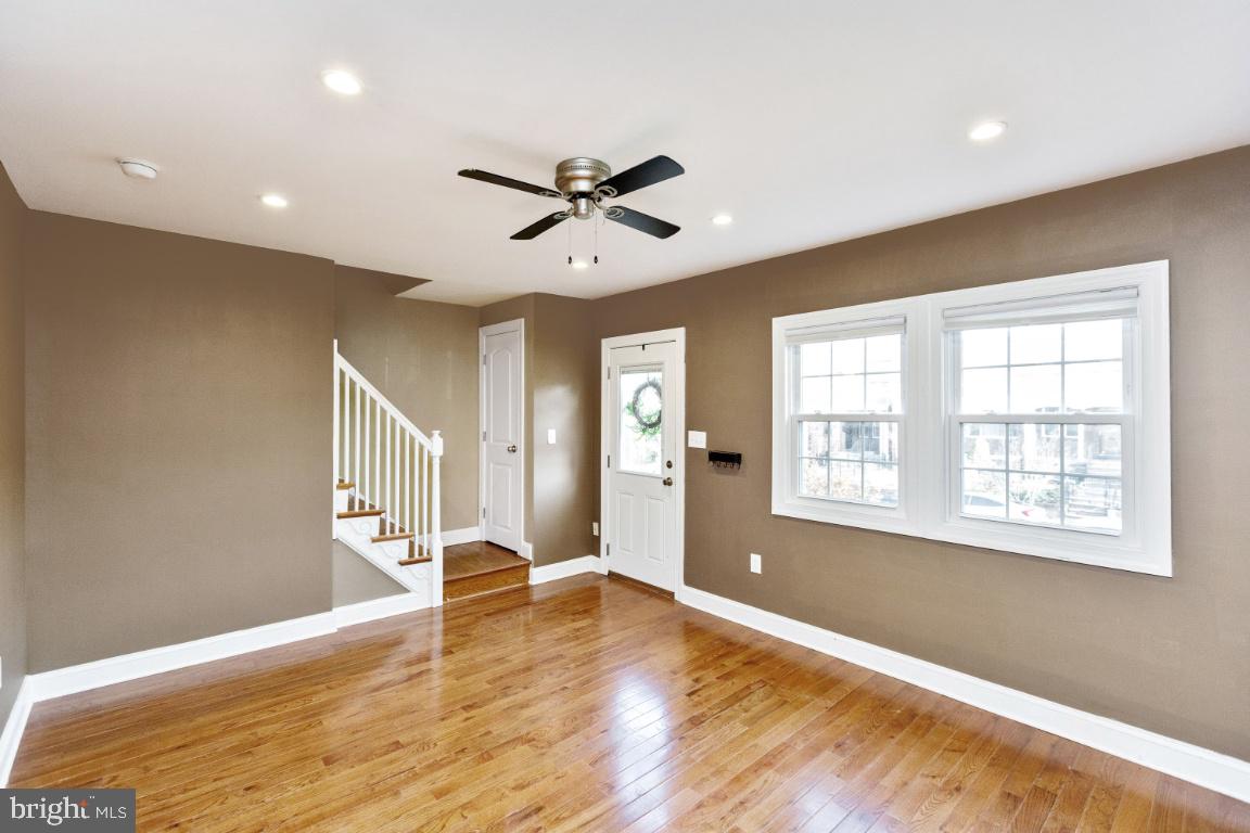 1348 Rittenhouse Street Northwest Washington, DC 20011 - Photo 4 of 27 Living Room with Large Windows for Great Lighting