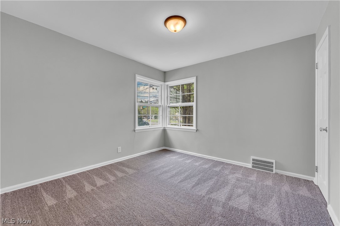 1828 South Green Road Cleveland, OH 44121 - Photo 16 of 30 View of carpeted spare room