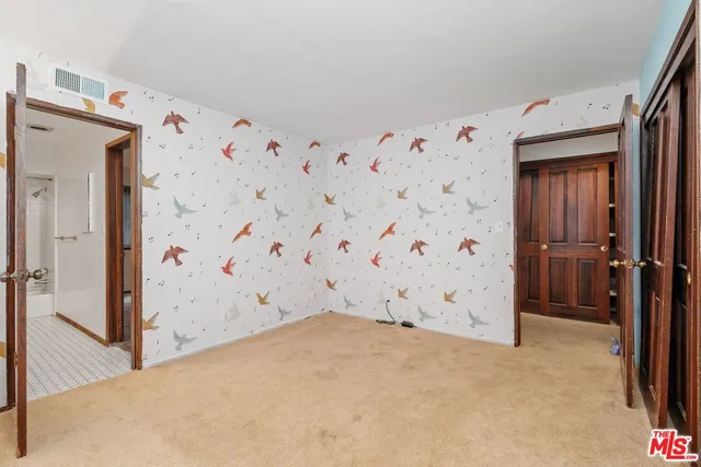 a bathroom with a sink double vanity and a bathtub