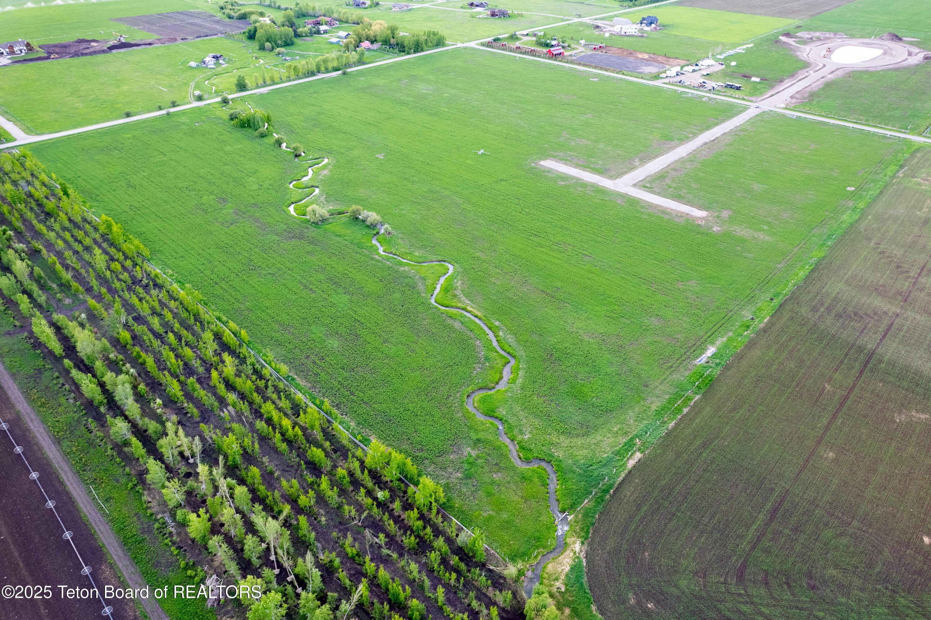 9500 West 9500 South Victor, ID 83455 - Photo 7 of 16 Aeriel View Canyon Wren sm file