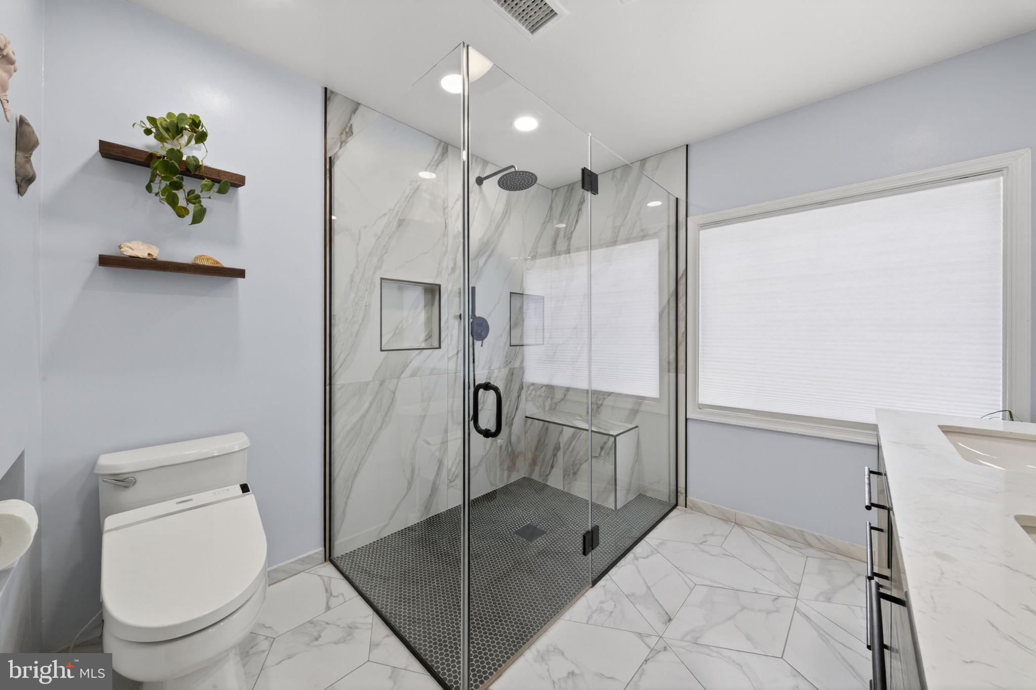 6006 Lincolnia Road Alexandria, VA 22312 - Photo 28 of 42 Sleek modern bathroom oasis.