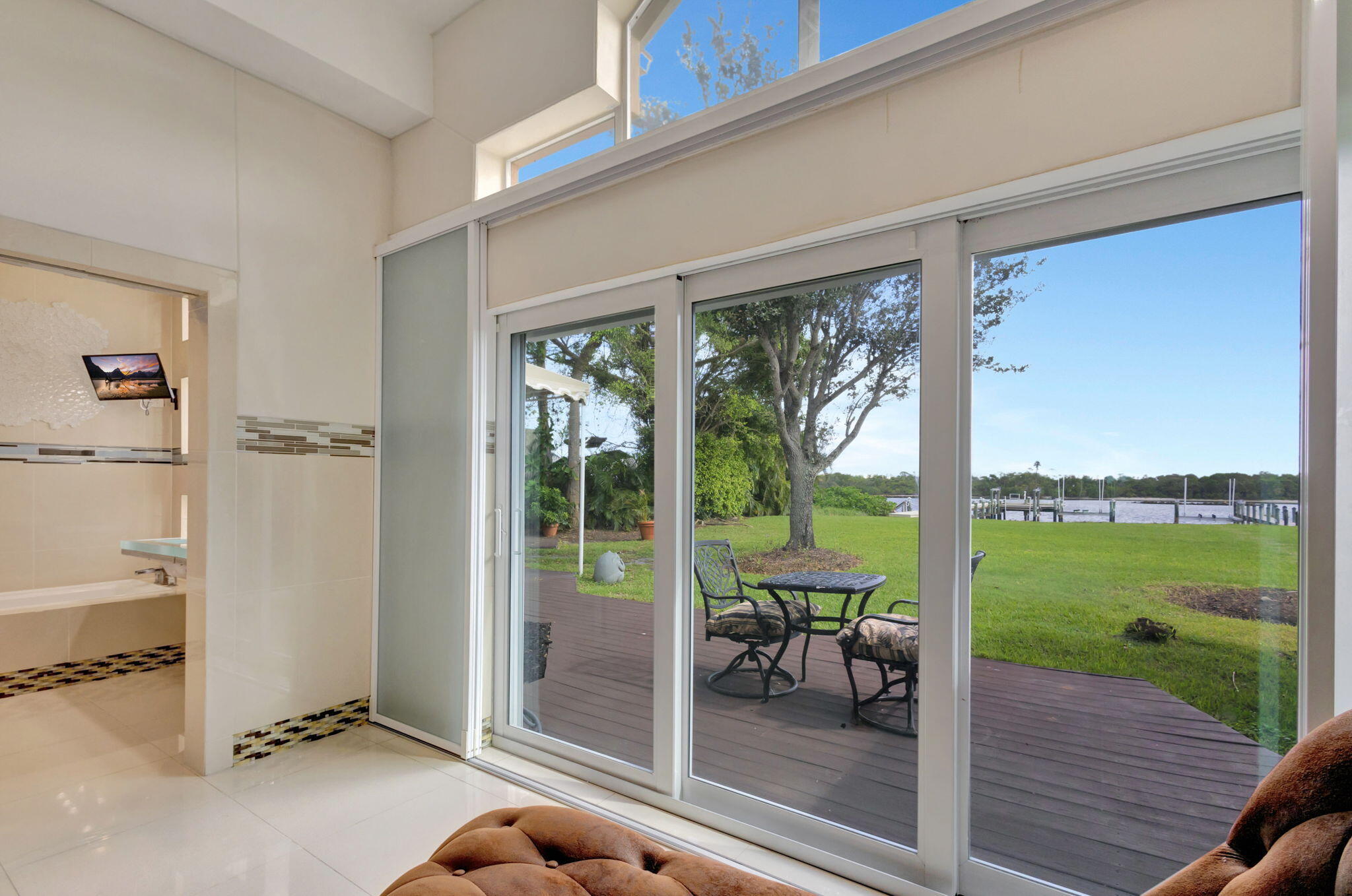 16334 Port Dickinson Drive Jupiter, FL 33477 - Photo 30 of 50 private patio off the bedroom