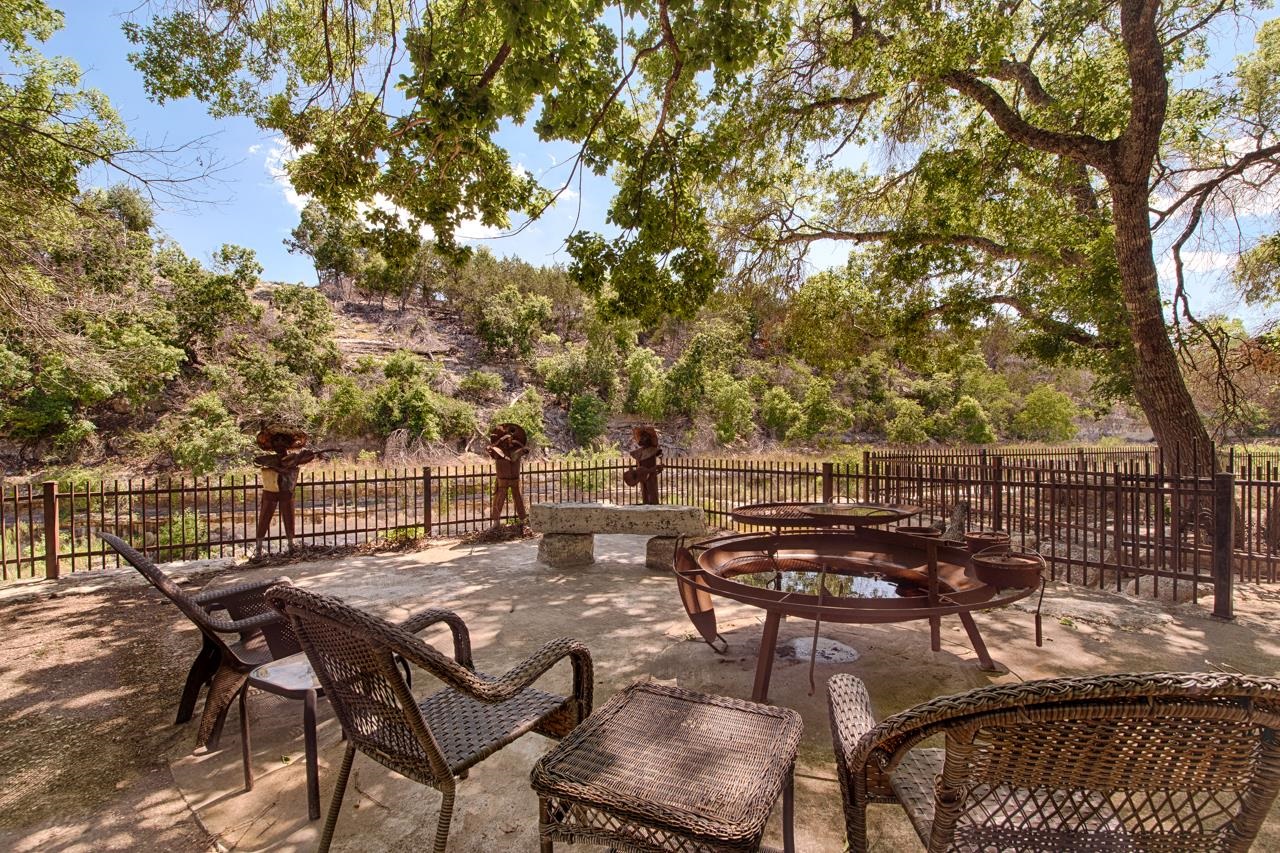 Lot 40 Pack Saddle Harper, TX 78631 - Photo 11 of 30 a view of a chairs and table in the patio