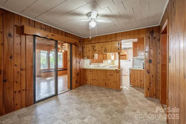 a bathroom with a tub sink vanity and a mirror