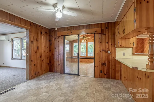 a view of a hallway with closet and entryway