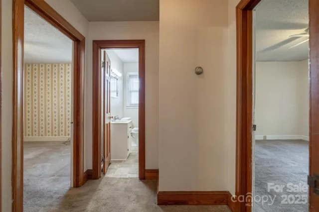 a view of a bathroom with a glass door