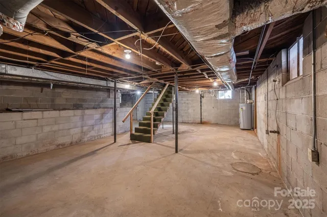 a view of an empty room with storage