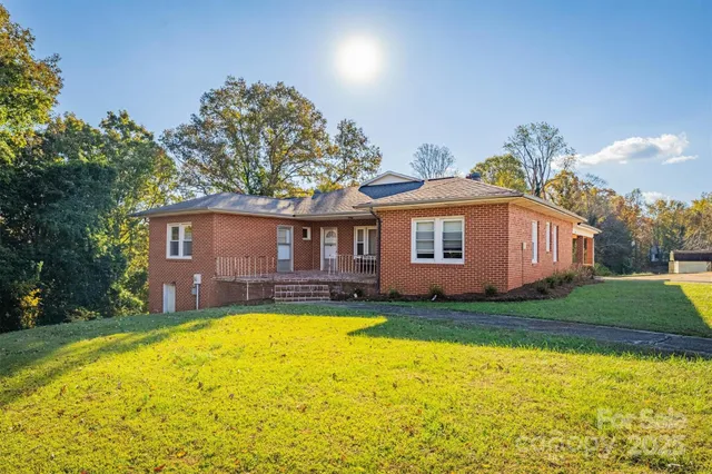 a front view of a house with swimming pool