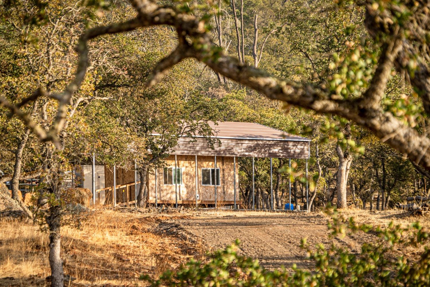 0 Ranch Road Valley Springs, CA 95252 - Photo 15 of 43 a front view of a house with a yard