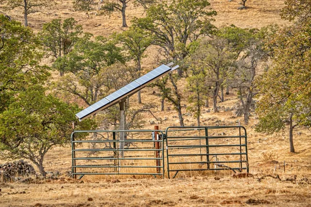 a view of a yard covered with snow in the yard