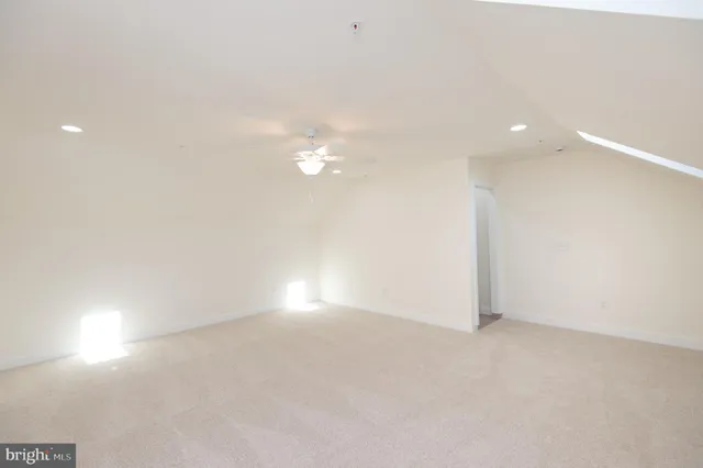 a view of a small space with wooden floor