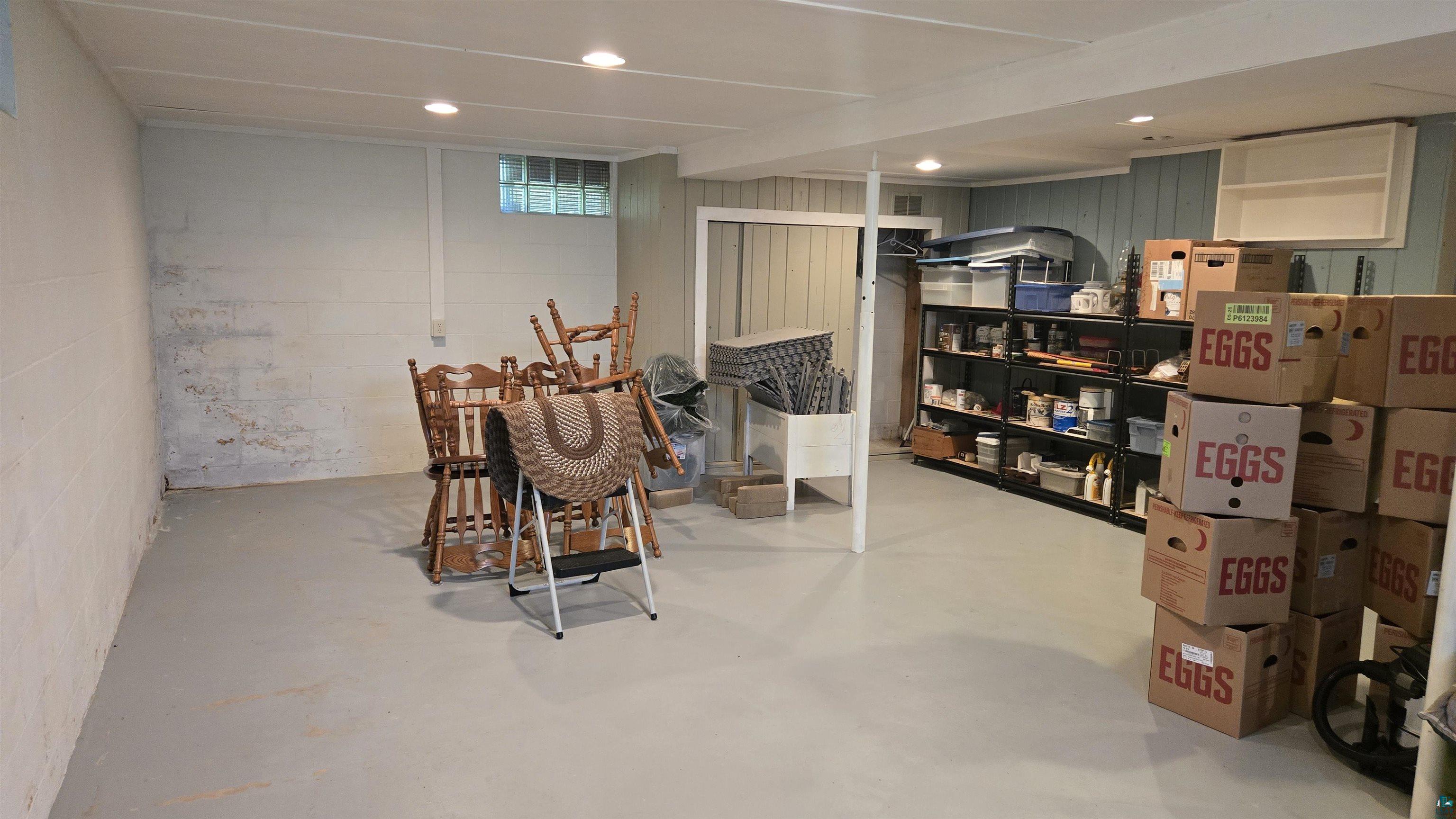 10614 Moose Lake Road Orr, MN 55771 - Photo 33 of 44 Spacious lower level offering concrete flooring and recessed lighting