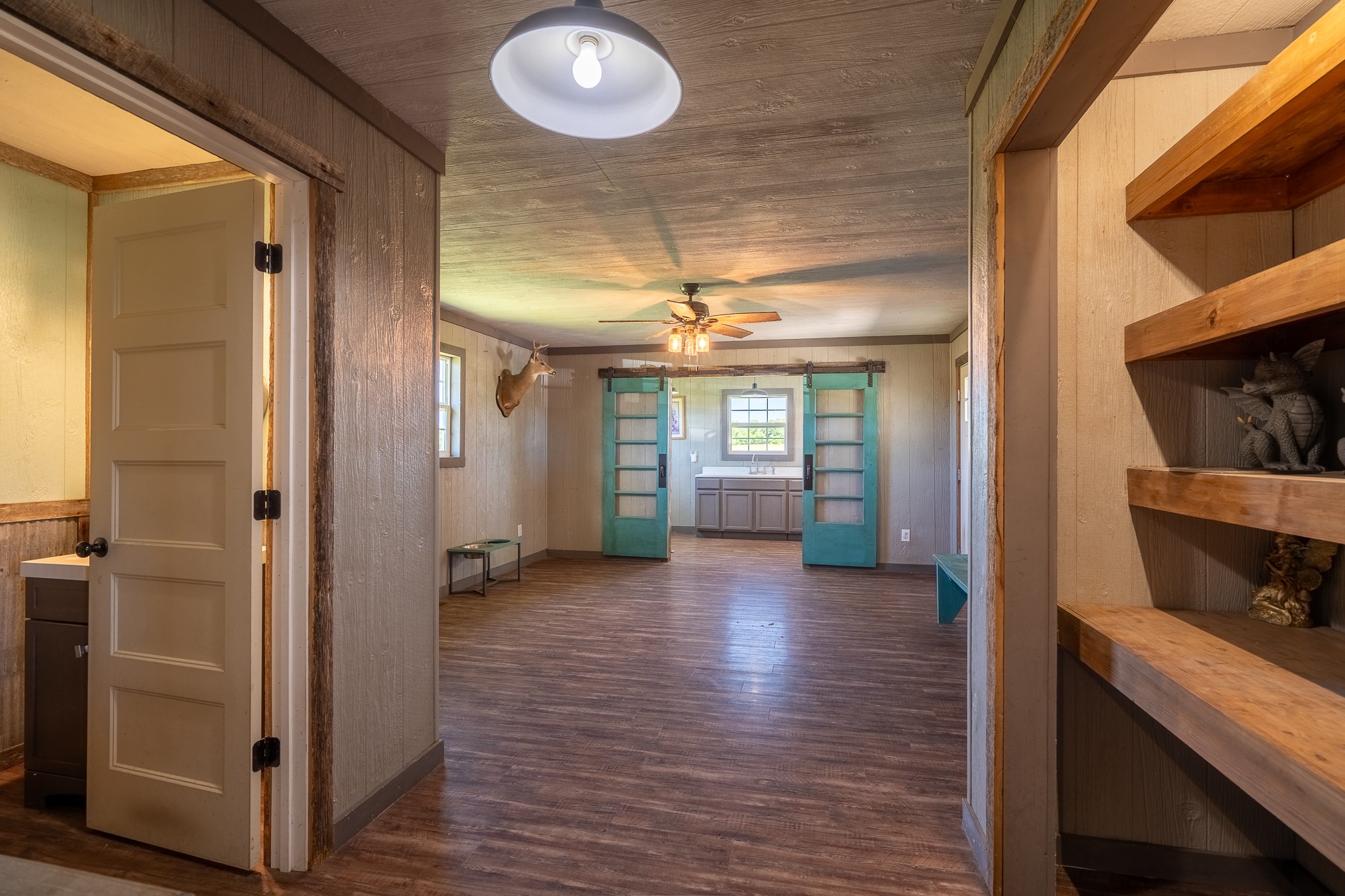 11220 Shelbyville Road Morrison, TN 37357 - Photo 14 of 67 a view of a hallway and wooden floor and dining room