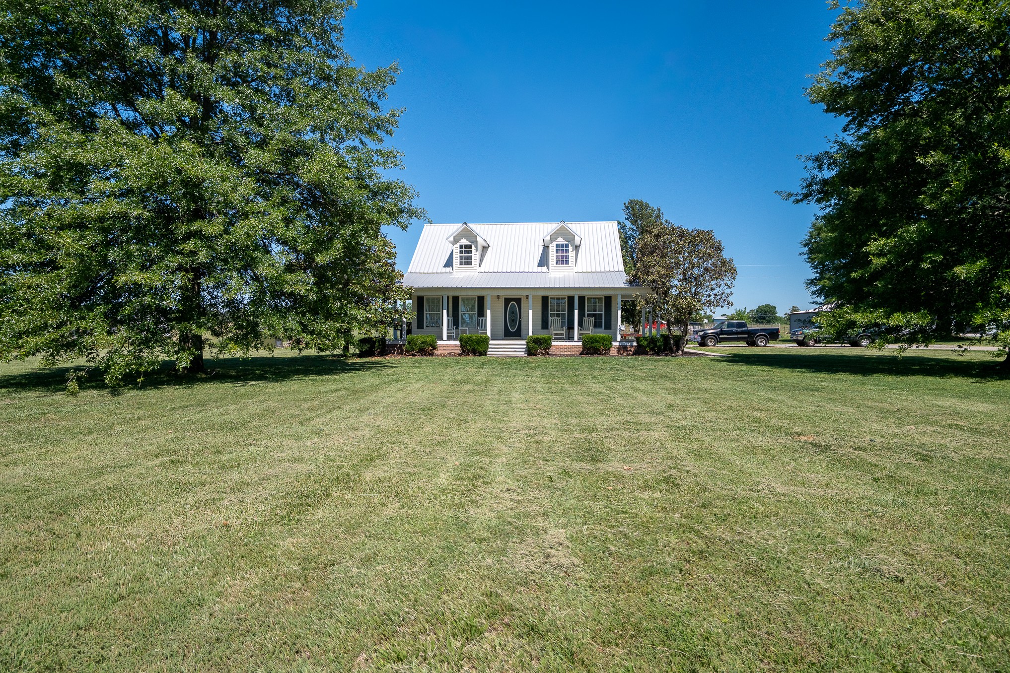 11220 Shelbyville Road Morrison, TN 37357 - Photo 2 of 67 a view of a big yard with plants and large trees