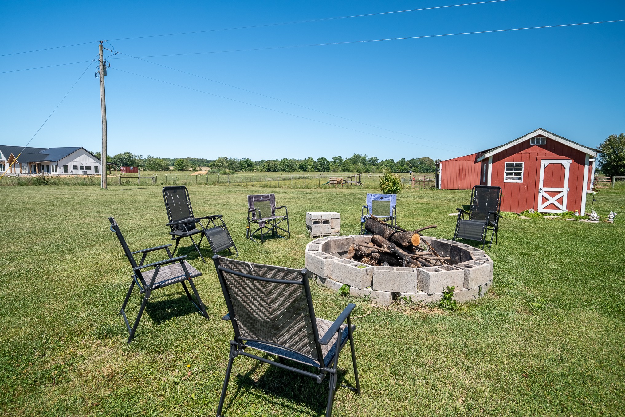 11220 Shelbyville Road Morrison, TN 37357 - Photo 34 of 67 a view of a lake with couches chairs and city view