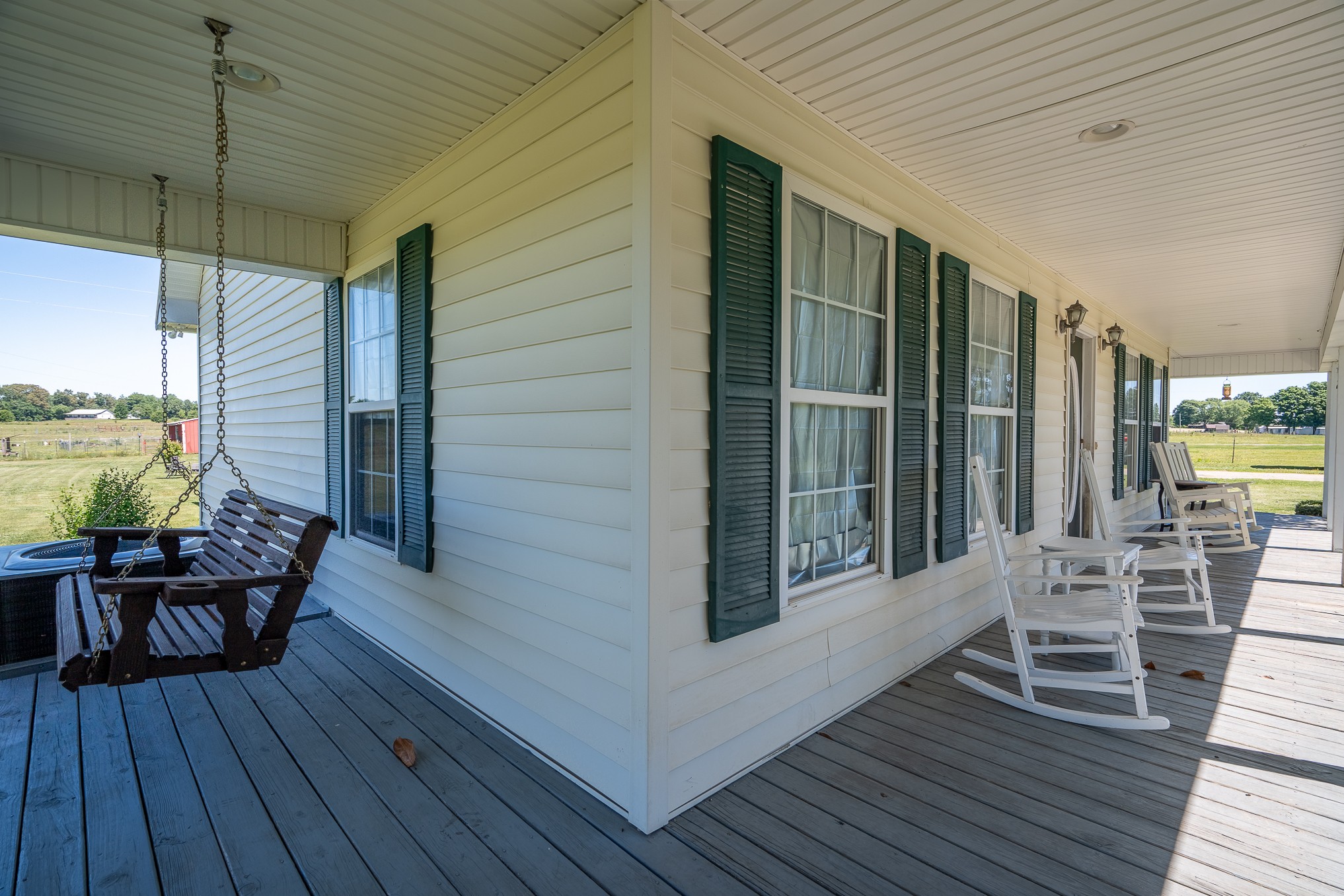 11220 Shelbyville Road Morrison, TN 37357 - Photo 47 of 67 a view of a chairs and table on the wooden deck