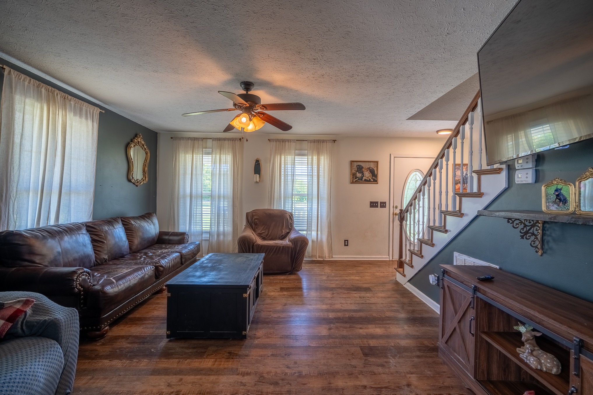 11220 Shelbyville Road Morrison, TN 37357 - Photo 7 of 67 a living room with furniture and a wooden floor