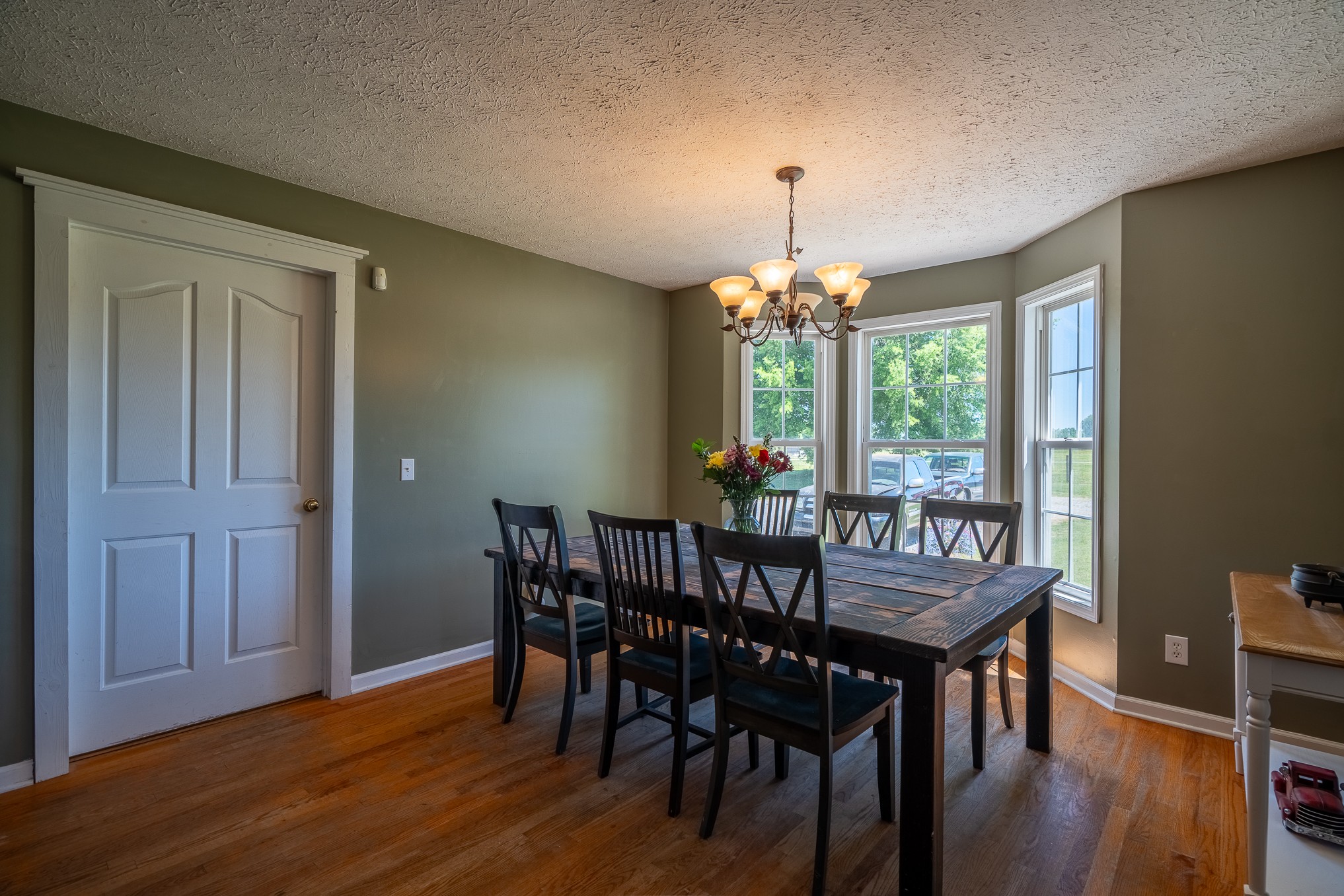 11220 Shelbyville Road Morrison, TN 37357 - Photo 8 of 67 a view of a dining room with furniture window and wooden floor