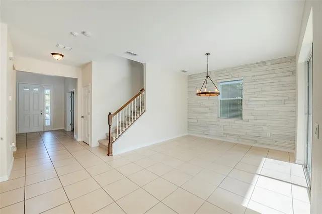 a view of a hallway with windows