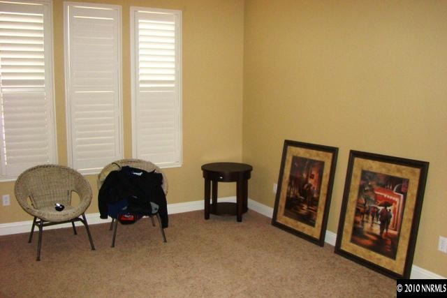 10550 Kenai Drive Reno, NV 89521 - Photo 6 of 9 a living room with furniture and a window