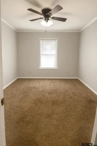 a bathroom with a toilet and a sink