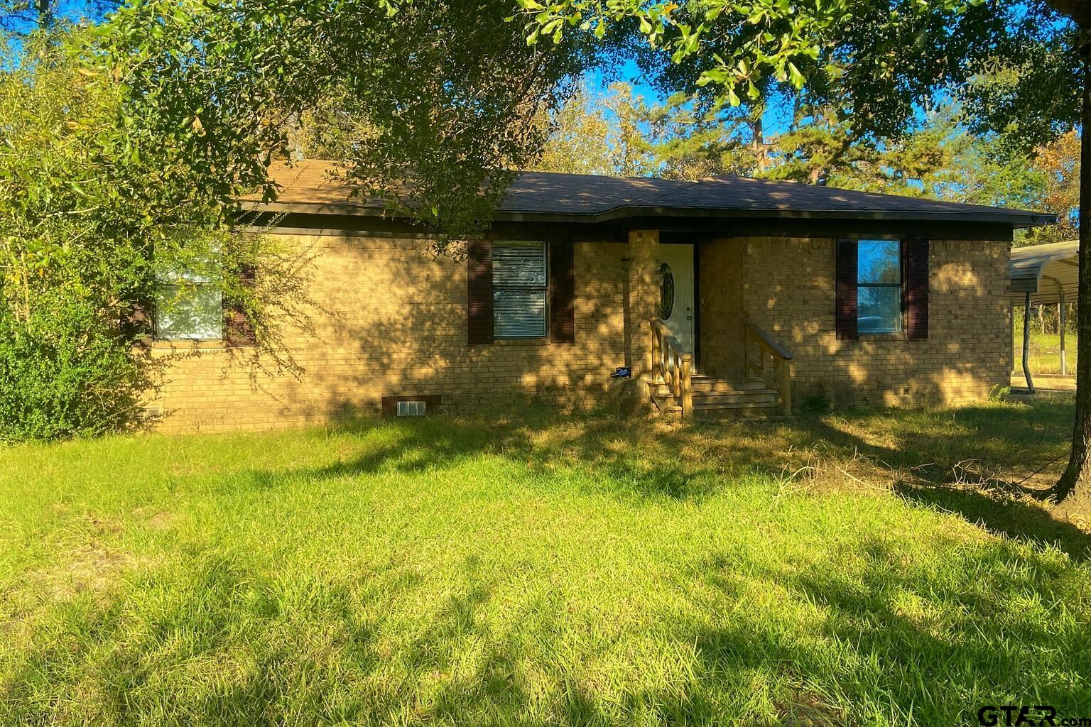 23601 State Highway 64 Troup, TX 75789 - Photo 5 of 19 a view of a backyard of the house