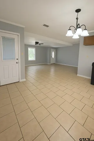 a view of a livingroom with natural light